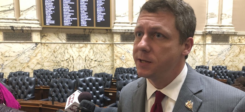 Del. Eric Luedtke, a Democrat, talks to reporters on Thursday, Feb. 20, 2020 in Annapolis, Md., about legislation to expand the state's sales tax to cover professional services to pay for a sweeping education measure.