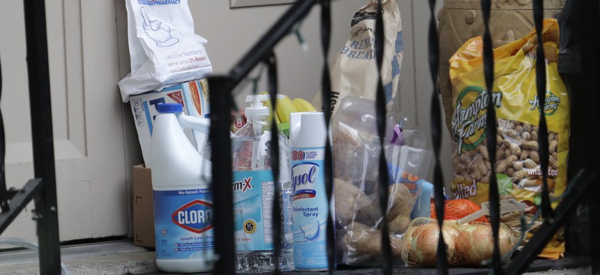 Groceries, cleaning supplies, prescription medicine, and other items are shown on the porch of a couple in Kirkland, Washington, who are in quarantine because  they visited patients at a nursing home that has been central to the coronavirus outbreak.