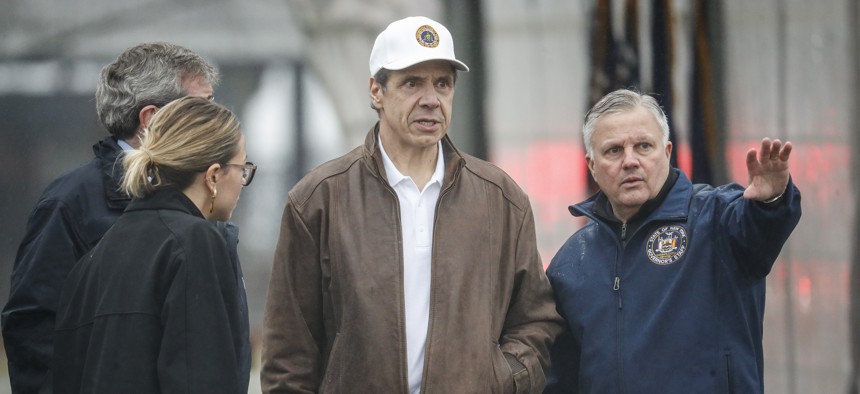 New York Governor Andrew Cuomo tours a COVID-19 infection testing facility. On Monday, the governors of New York, New Jersey, and Connecticut established three-state guidelines on social distancing and limits on recreation.