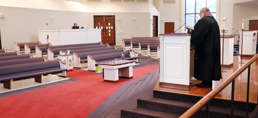  Rev. Kip Rush delivers his sermon on March 15, 2020 in a sanctuary filled with mostly empty pews at Brenthaven Cumberland Presbyterian Church in Brentwood, Tenn. The church decided to broadcast the service instead of holding regular services.