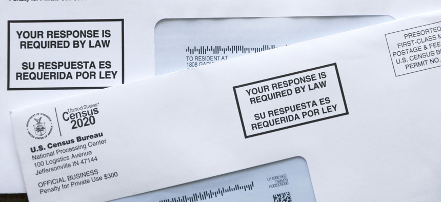 In this Tuesday, March 24, 2020 photo, forms from the U.S. Census Bureau arrive at a home in Orlando, Fla. The coronavirus has waylaid efforts to get as many people as possible to take part in the census.