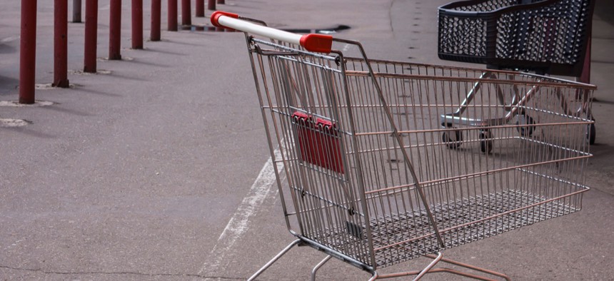 Viruses can linger on surfaces like grocery carts.