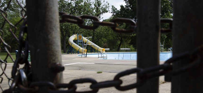 An empty municipal swimming pool is seen at Jordan Park in Allentown, Pa., Friday, May 29, 2020. 