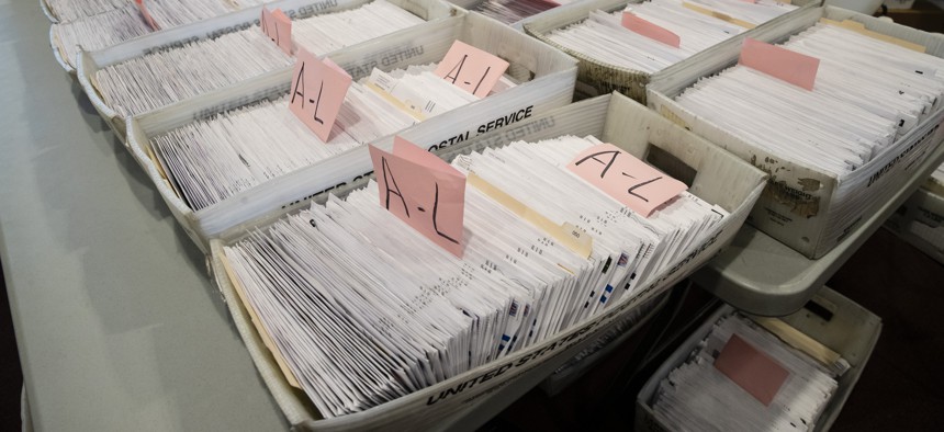 Processed mail-in ballots are seen at the Chester County Voter Services office in West Chester, Pa., prior to the primary election on May 28, 2020.