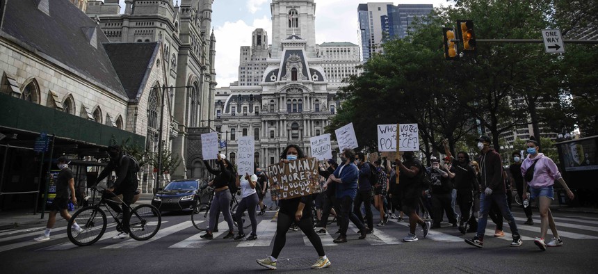 Protesters march in Philadelphia, Monday, June 1, 2020 calling for justice over the death of George Floyd. 