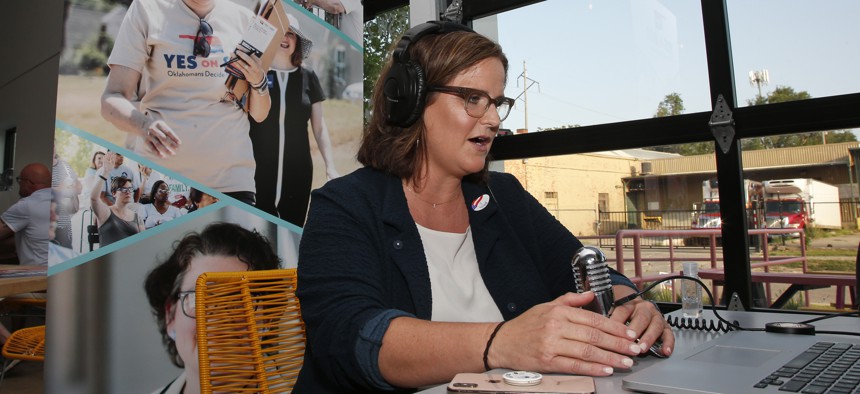 Amber England, campaign manager, Yes on 802, addresses supporters via the internet Tuesday, June 30, 2020, in Oklahoma City, as due to Covid-19 concerns, a virtual watch party replaces the normal watch party.