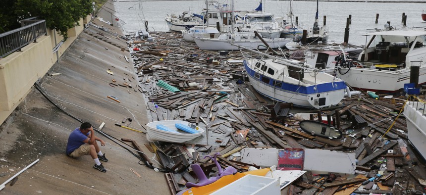 Allen Heath surveys the damage to a private marina after it was hit by Hurricane Hanna on July 26, 2020, in Corpus Christi, Texas. Heath's boat and about 30 others were lost or damaged. 