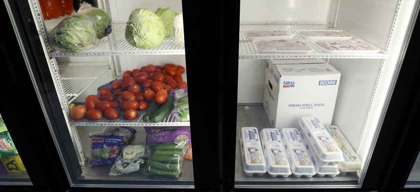 Produce, meat and eggs sit in a cooler at a local super market, Friday, May 29, 2020, in Des Moines, Iowa. 