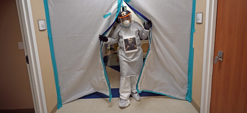 Dr. Joseph Varon enters a patient wing inside the Coronavirus Unit at United Memorial Medical Center on July 6, 2020, in Houston. 