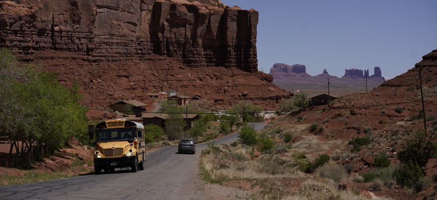 A school bus drives through the Navajo Nation in April.