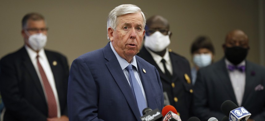 Missouri Gov. Mike Parson speaks during a news conference Thursday, Aug. 6, 2020, in St. Louis. Officials announced St. Louis has been added to the list of cities that will receive federal assistance through Operation Legend.