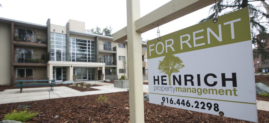 In this Jan. 2018 file photo "For Rent" sign is posted outside an apartment building in Sacramento, Calif. 