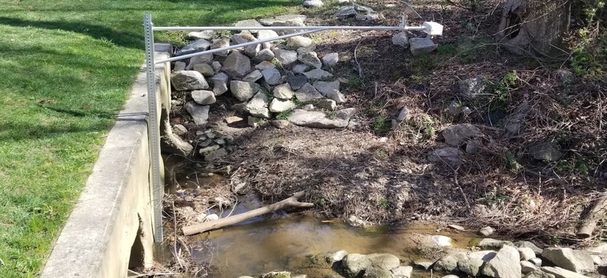 A sensor keeps tabs on water levels in the Walnut Creek stream basin in Cary, N.C.