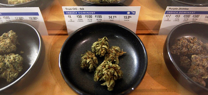 This 2018 photo shows marijuana on display at a marijuana dispensary in Oakland, Calif.