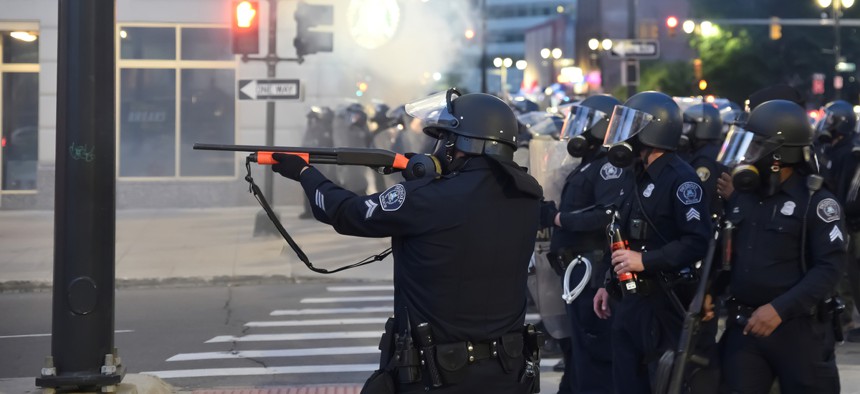 Detroit police fire rubber bullets at a protest in May.