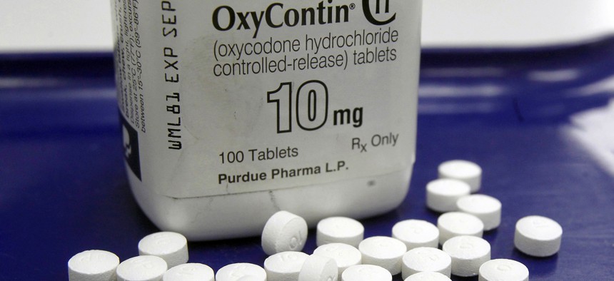 This Feb. 19, 2013, file photo shows OxyContin pills arranged for a photo at a pharmacy in Montpelier, Vt. Purdue, the maker of OxyContin, is facing about 2,500 lawsuits seeking to hold it accountable for the opioid crisis.