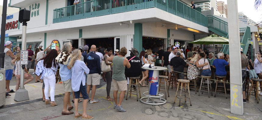 People seen partying at the Elbo Room in Fort Lauderdale as Florida Gov. Ron DeSantis announced on Friday that, effective immediately, Florida moves to phase 3 of coronavirus reopening plan with bars and restaurants potentially allowed at full capacity.