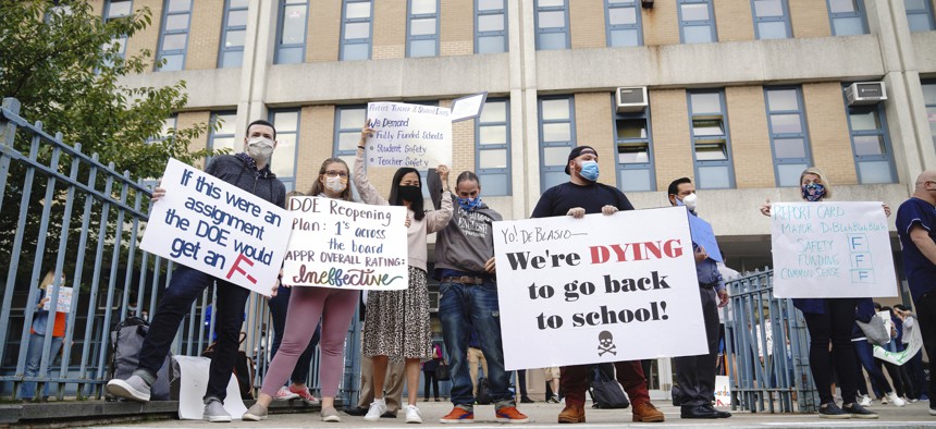 Students and teachers from Benjamin N. Cardozo High School in Oakland Gardens, Queens, New York held a protest against in-person learning as teachers raise new concerns over schools' readiness against Covid-19 on Sept. 17, 2020.