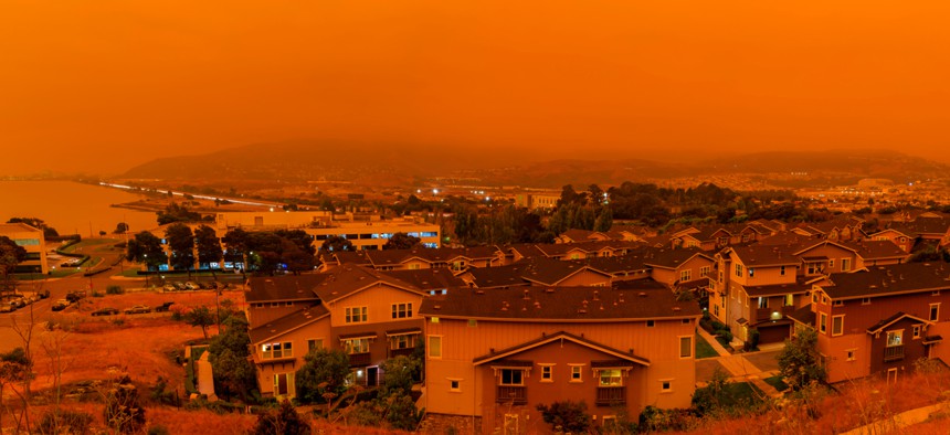 Thick orange haze above San Francisco in early September from record wildfires in California. States should partner with the insurance industry to address climate change and the associated effects.