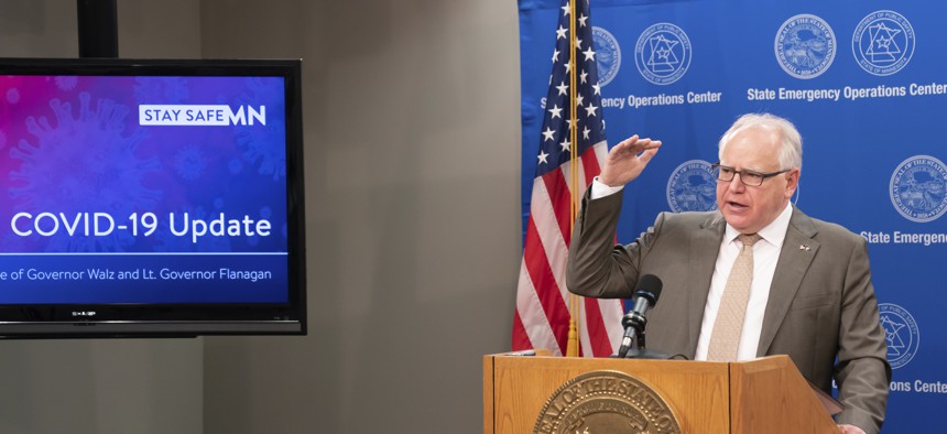 Minnesota Gov. Tim Walz at a briefing in May. Minnesota's coronavirus data dashboard is a model for how states can better use data in the pandemic and beyond. 