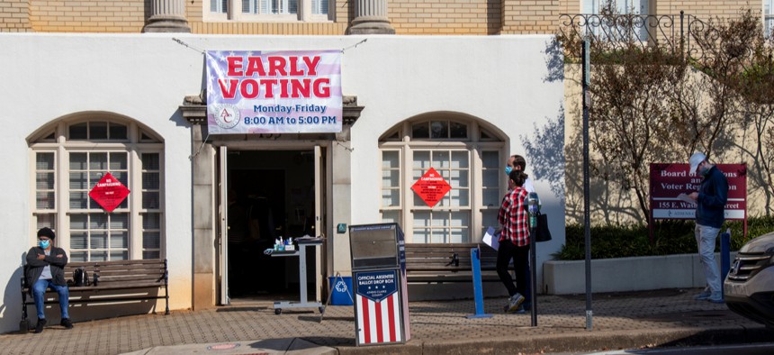 Voters wait outside a polling place in Athens, Georgia.