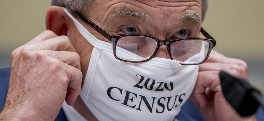 Census Bureau Director Steven Dillingham wears a mask with the words "2020 Census" as he arrives to testify before a House Committee on Oversight and Reform hearing on the 2020 Censusâ€‹ on Capitol Hill on July 29, 2020, in Washington. 