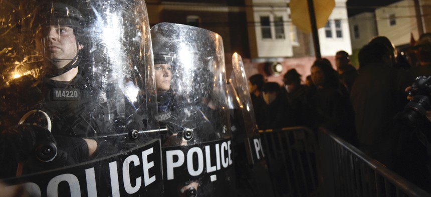 Philadelphia police officers form a line during a demonstration in Philadelphia, late Tuesday, Oct. 27, 2020. 