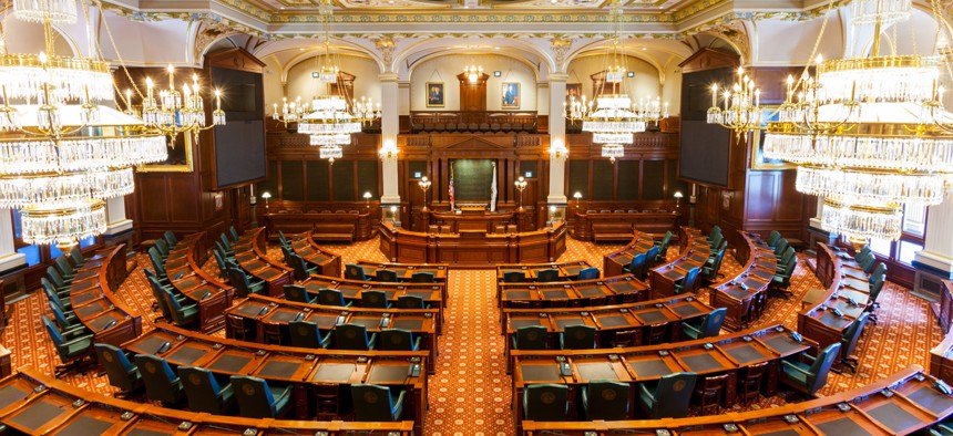 The Illinois state Senate chamber. In May, the state legislature approved its budget in a concert arena in Springfield. 