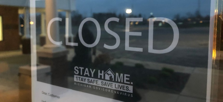 A closed store in Dexter, MI. The Michigan state Supreme Court ruled last month that the governor can’t extend an emergency declaration without the legislature’s consent and struck down one of two laws giving Gov. Gretchen Whitmer emergency authority.