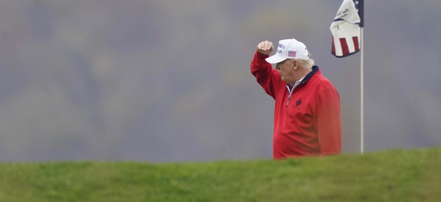 President Donald Trump, plays golf at the Trump National Golf Club in Sterling, Va., Saturday, Nov. 21, 2020.