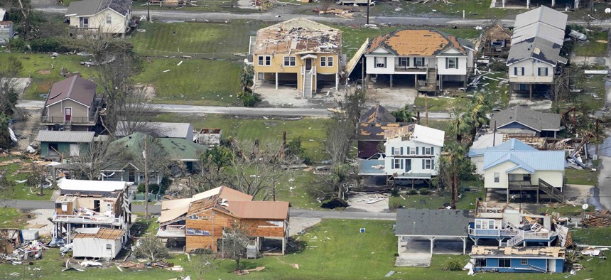 Buildings and homes are damaged in the aftermath of Hurricane Laura Thursday, Aug. 27, 2020, near Lake Charles, La. 