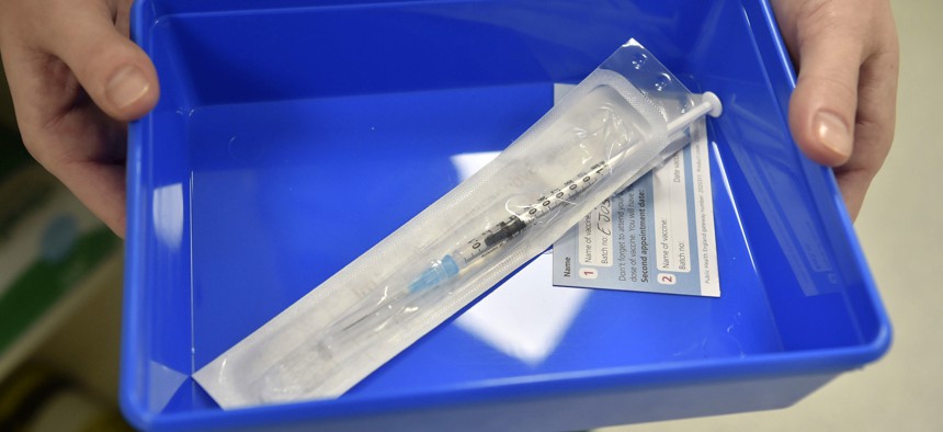 The Pfizer-BioNTech COVID-19 vaccine at a vaccination centre in Cardiff, Wales, Tuesday Dec. 8, 2020. The United Kingdom is beginning its vaccination campaign this week. 