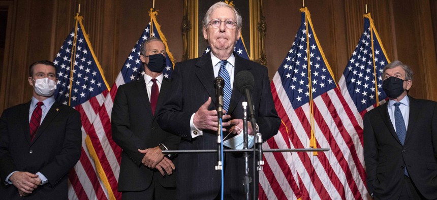 Senate Majority Leader Mitch McConnell of Kentucky, speaks to the media after the Republican's weekly Senate luncheon, Tuesday, Dec. 8, 2020 at the Capitol in Washington. 