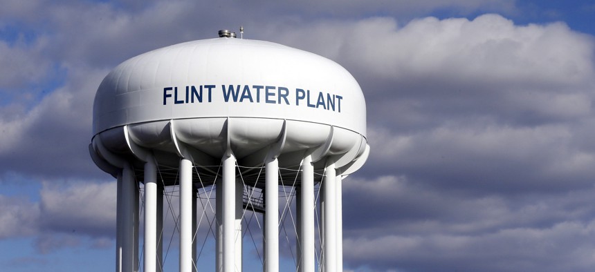 The Flint Water Plant water tower is seen in Flint, Mich. in 2016.