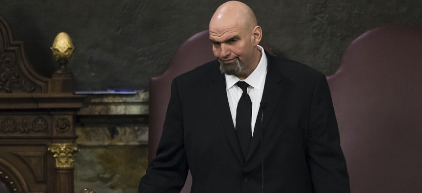 Lt. Gov. John Fetterman gavels in a joint session of the Pennsylvania House and Senate before Democratic Gov. Tom Wolf delivers his budget address for the 2019-20 fiscal year, Harrisburg, Pa., Tuesday, Feb. 5, 2019.