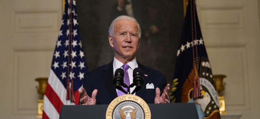 resident Joe Biden delivers remarks on COVID-19, in the State Dining Room of the White House, Tuesday, Jan. 26, 2021, in Washington. 