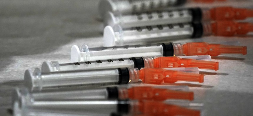 These are syringes loaded with the Moderna COVID-19 Vaccine, during a vaccination clinic hosted by the University of Pittsburgh and the Allegheny County Health Department at the Petersen Events Center, in Pittsburgh, Thursday, Jan. 28, 2021. 