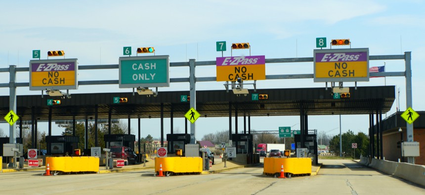 E-ZPass and cash only lanes at a toll exit in Pennsylvania. Technology can pave the way for cashless tolling.