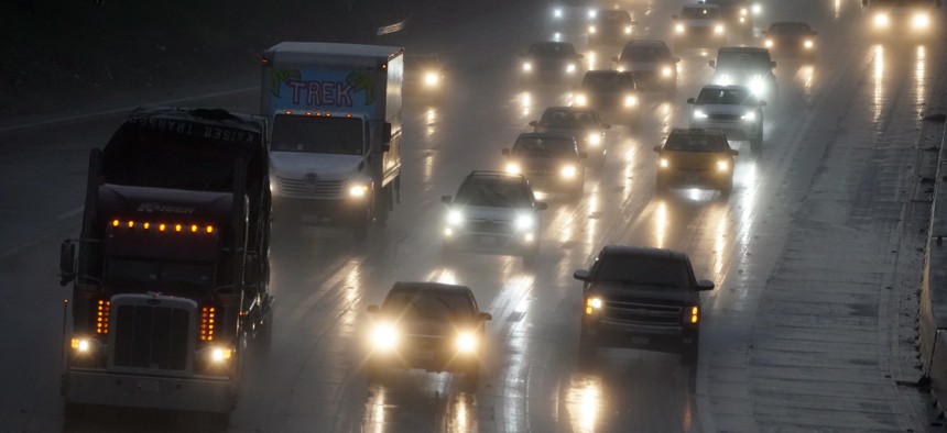 Traffic makes its way on a rain-soaked Interstate 5, Monday, Dec. 28, 2020, in Sun Valley, Calif. 