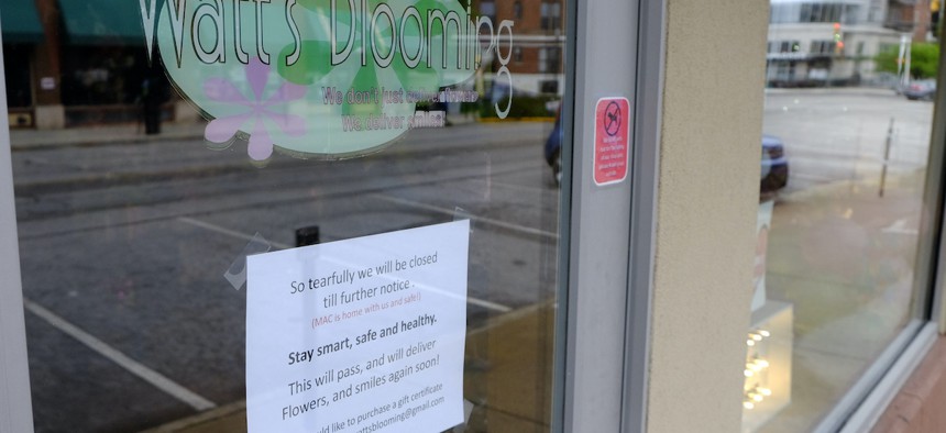 A florist remains closed in downtown Indianapolis, Friday, May 15, 2020.