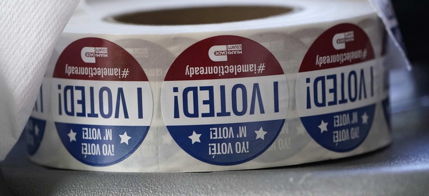 A roll of "I Voted!" stickers are shown, Tuesday, Oct. 6, 2020, at the Miami-Dade County Elections Department in Doral, Fla. 