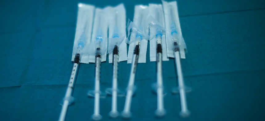 Syringes with Pfizer/Biontech COVID-19 vaccines are ready to be used on Wednesday, Jan. 27, 2021. 