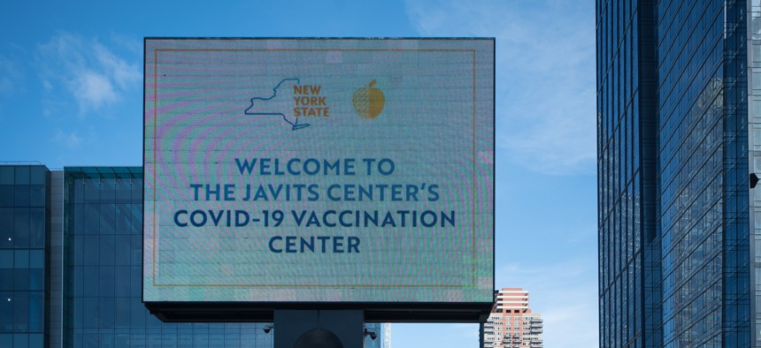 Digital billboard outside the The Jacob K. Javits Convention Center in New York City now a state vaccination center.