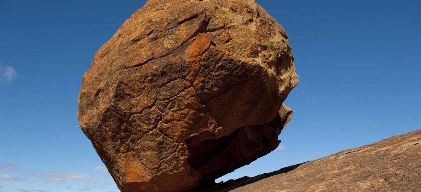 A stock photo of a boulder in Australia. It looks to be the size of a large boulder.