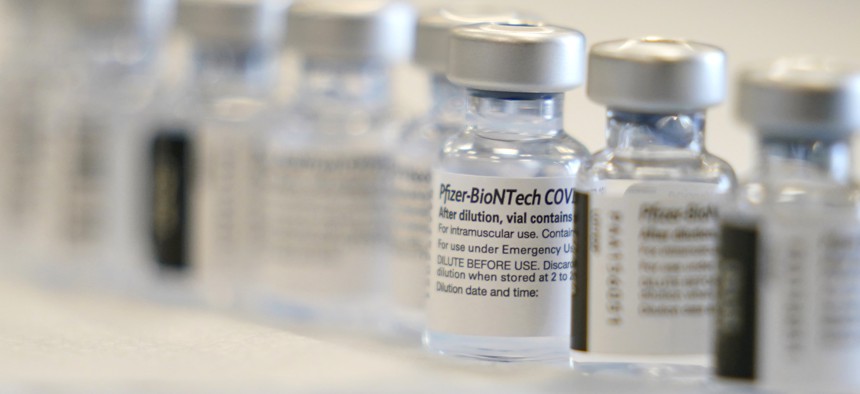 Bottles fo the COVID-19 vaccine are ready to be prepared before the opening of a mass vaccination site in the Queens borough of New York, Wednesday, Feb. 24, 2021.