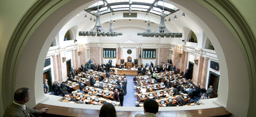 The Kentucky House of Representatives conducts first-day business Tuesday, Jan. 3, 2012, in Frankfort, Ky.                    