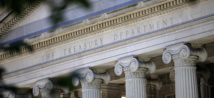 The U.S. Treasury Department building at dusk in Washington.