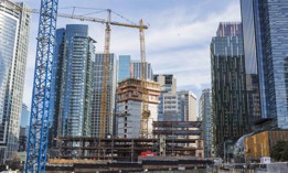 Construction cranes and skyscrapers in Seattle.