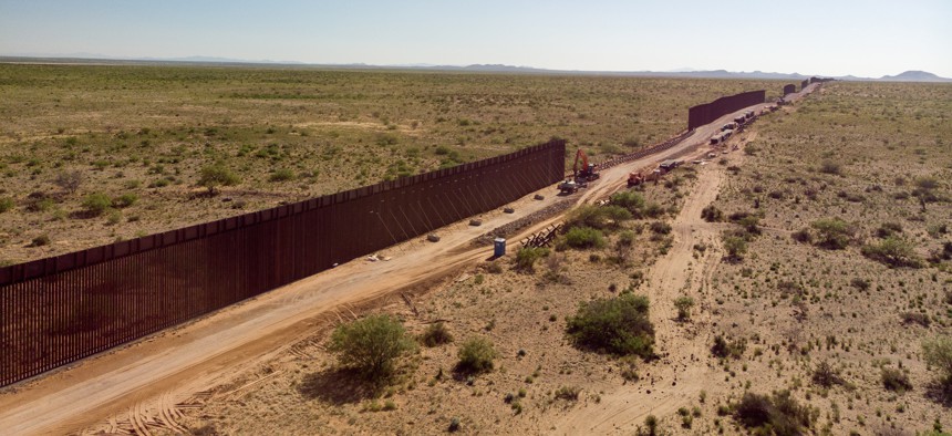 A Texas Border Wall with sections that are still under construction.