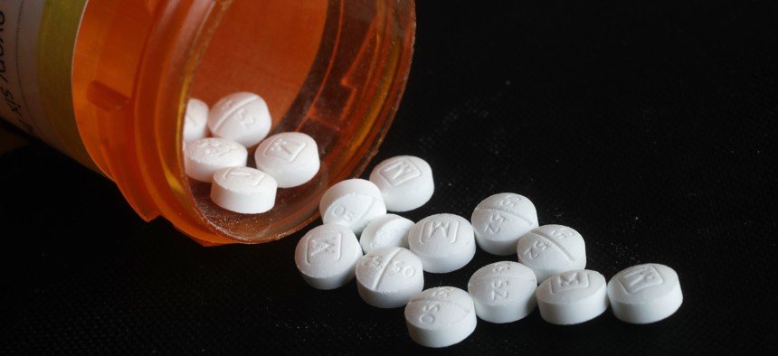 This Aug. 29, 2018, file photo shows an arrangement of prescription oxycodone pills in New York.